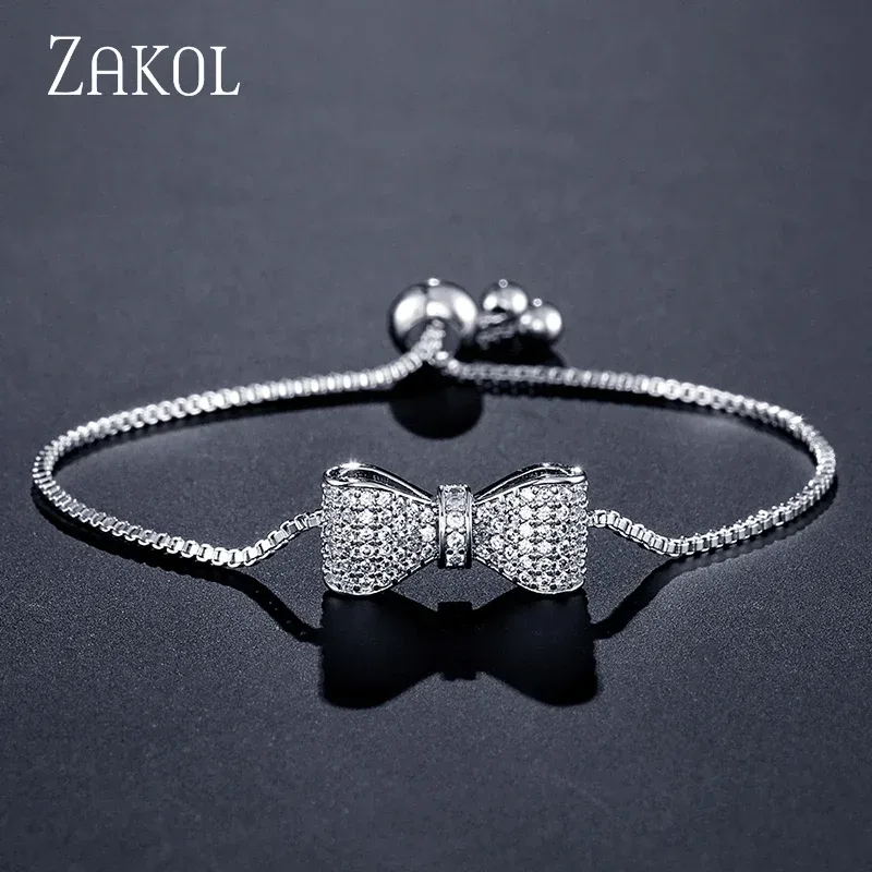ZAKOL Modisches verstellbares Armband und Armreif mit Schleife und Zirkonia-Kristall für Damen, brillanter CZ-Party-Schmuck