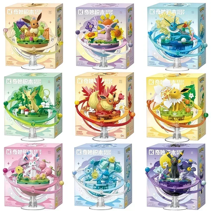 Neue Keeppley Original Pokemon DIY Bausteine Spielzeug Cartoon Eevee Familie Planeten-Serie Montagemodell Ornamente Geschenk für Fans