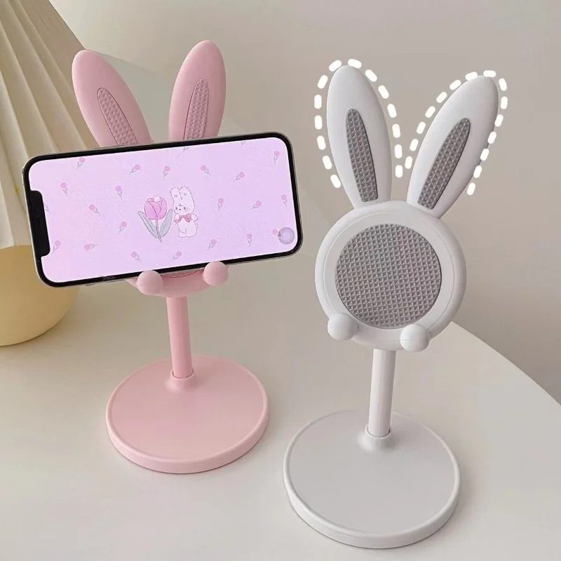 Der niedliche Hasen-Handyhalter für den Schreibtisch kann den Schreibtisch-Handyzubehör anheben und anpassen. Handyhalterung, Handygriff.