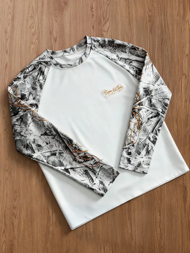 2026 Sommer Neuer Stil Camouflage-Blätter-Print Raglan-Langarm-T-Shirt Kursivschrift-Grafik Mode Lässige Streetwear Oberteile Kinder