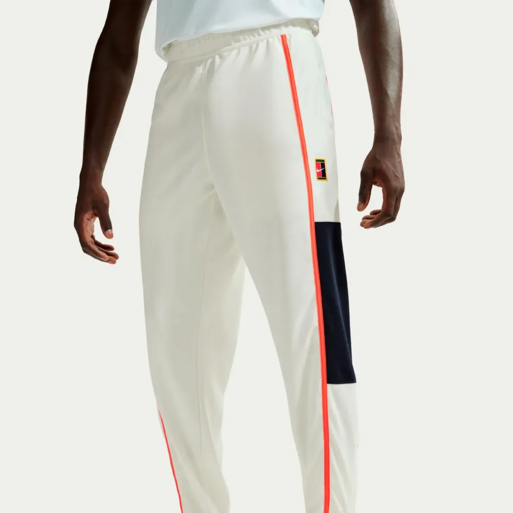 Nike Court Heritage Trainingshose Herren - creme, orange