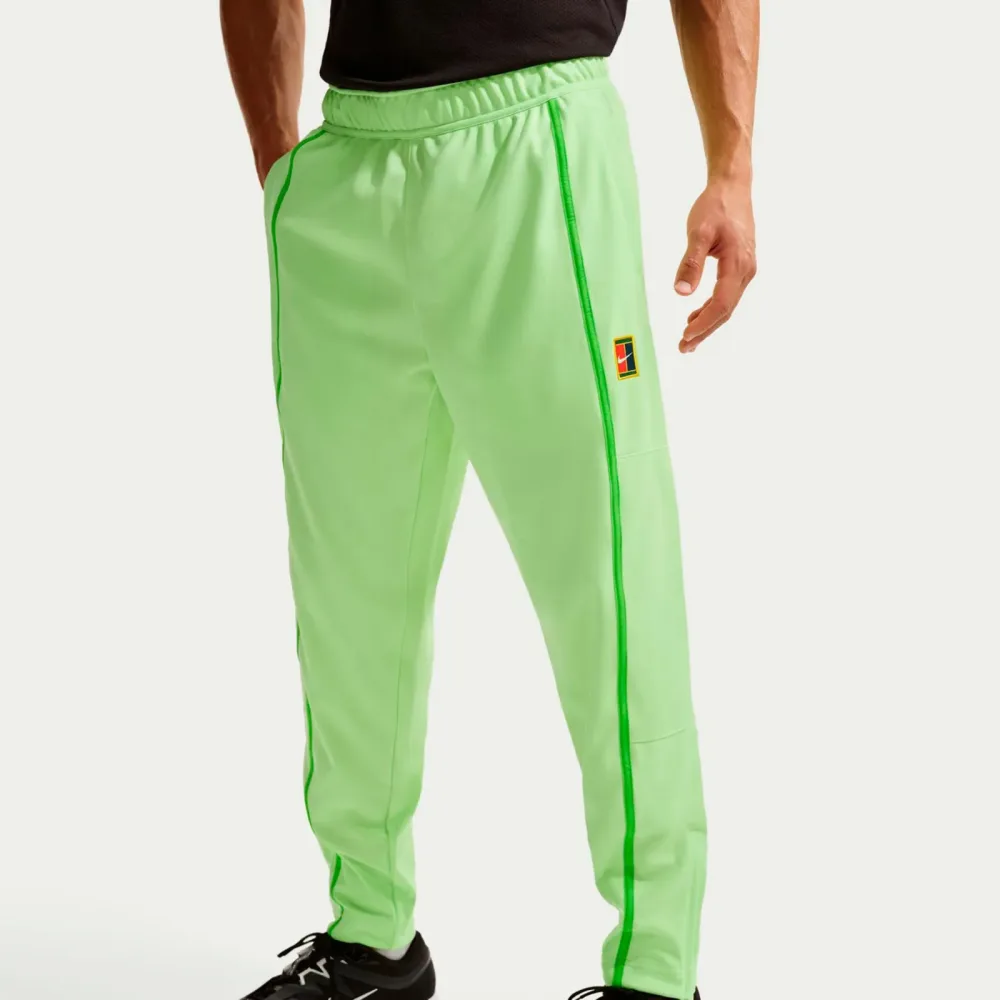 Nike Carlos Alcaraz Court Heritage Trainingshose Herren - limette