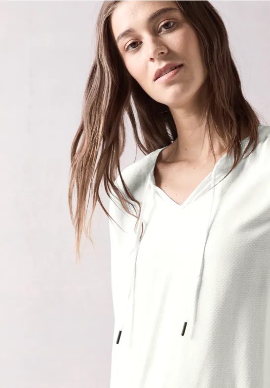 Bluse mit elastischem Saum
