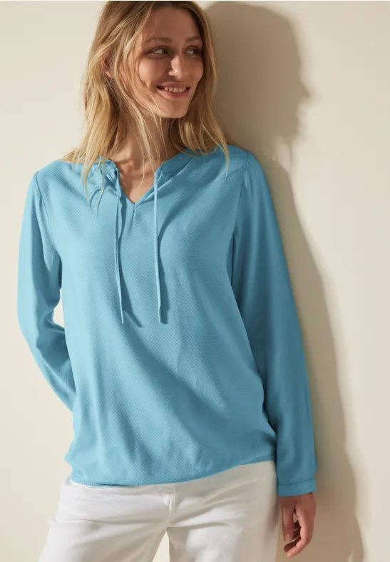 Bluse mit elastischem Saum