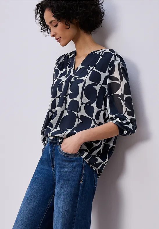 Gemusterte Bluse mit Tape