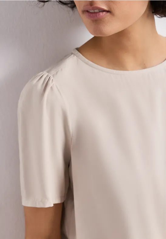 Bluse mit Rundhals und kurzen Puffärmeln