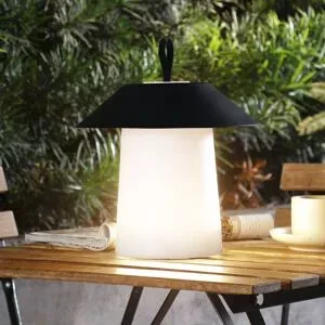 Lindby LED-Akkutischleuchte Kalina, schwarz/weiß, IP44 Kalina Lindby, dimmbar, schwarz, Kunststoff, Modern