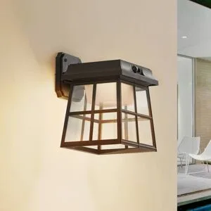 Lindby Solar-LED-Wandleuchte Latarka, Höhe 24 cm, Sensor Latarka, schwarz, Kunststoff, Modern, Solarleuchte außen