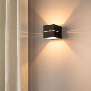 LUSENZ Gemini nero oro - Würfelförmige Up-and-Down-Wandleuchte mit mattschwarzer Beschichtung und orangefarbenes Interieur