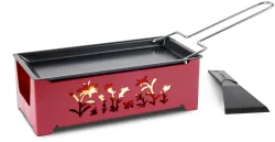 Nouvel Raclette-Ofen mit Kerzen Blumen