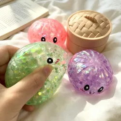 Bandai, Glitzerndes, farbenfrohes, simuliertes Knödel-Squishy: Entspannendes Anti-Stress-Spielzeug zur Linderung von Angstzuständen und Steigerung des Wohlbefindens