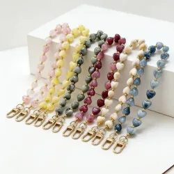 NONE, Modische Acryl-Handykette mit Herzanhänger, Perlen-Telefonband, Handy-Hängeschnur für Damen, Schmuck