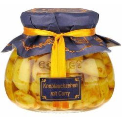 Knoblauchzehen mit Curry  in Öl und Essig