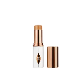 CHARLOTTE TILBURY - Unreal Skin Sheer Glow Tint - Feuchtigkeitsspendender Foundation-Stick, 8 g,  Tan